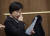 이수진 더불어민주당 의원이 지난 22일 국회에서 탈당 기자회견을 앞두고 맺힌 눈물을 닦고 있다.    연합뉴스