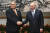 블라디미르 푸틴 러시아 대통령(오른쪽)과 오르반 총리가 지난해 10월 17일 중국 베이징에서 열린 일대일로 포럼을 계기로 한 정상회담에 앞서 악수하고 있다. AP=연합뉴스