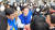 이재명 민주당 대표가 12일 인천 서구을 이용우 후보의 지원사격 도중 만난 국민의힘 박종진 인천 서구을 후보의 손을 잡고 있다. 오른쪽 아래는 안철수 의원. 사진 이재명 유튜브 
