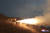 북한이 지난 19일 실시한 중장거리급 극초음속 미사일의 고체연료 엔진 연소시험. 조선중앙통신