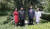 지난 2018년 6월 20일 김정은 북한 국무위원장 부부와 시진핑 중국 국가주석 부부가 베이징 댜오위타이의 김일성 나무 앞에서 기념촬영을 하고 있다. 연합뉴스TV 캡처