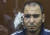 러시아 모스크바 공연장 테러를 일으키 타지키스탄 출신 한 피의자가 24일 바스마니 지방 법원에서 열린 재판에 출석했다. 당국으로부터 심한 고문을 받아 오른 귀에 붕대가 감겨있다. EPA=연합뉴스