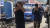 지난 2일(현지시간) 필리핀 세부에서 한국인 집을 털다가 경찰과 총격전 끝에 체포된 한국인 강도 용의자 2명이 마볼로 경찰서로 연행되고 있다. 사진 선스타 캡처