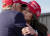 공화당 대선 후보이자 전 대통령 도널드 트럼프(왼쪽)가 지난 3월 16일 오하이오주 반달리아에서 열린 유세 집회에서 크리스티 노엠 사우스다코타 주지사를 포옹하고 있다. AP=연합뉴스
