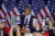 도널드 트럼프 전 대통령이 지난 1월 뉴햄프셔주 내슈아에서 열린 예비선거 유세에서 연설하는 모습을 지지자들이 스마트폰으로 촬영하고 있다. AP=연합뉴스