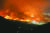 지난 2019년 강원도 고성군 토성면 원암리의 한 주유소 인근 야산에서 발생한 산불이 강풍을 타고 인근 속초까지 번지는 모습. 사진 강릉산림항공관리소