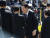 윤석열 대통령이 18일 광주 북구 국립5·18민주묘지에서 열린 5·18민주화운동 제44주년 기념식에 5·18 유가족과 인사하고 있다. 뉴스1