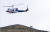 19일 이란 대통령 에브라힘 라이시를 태운 헬리콥터가 이란-아제르바이잔 국경 근처에서 이륙하고 있다. 로이터=연합뉴스