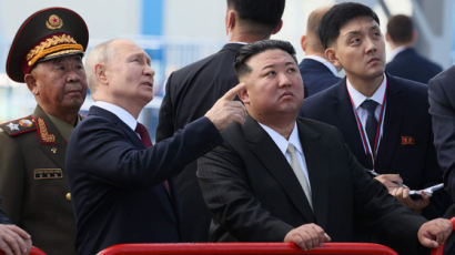 김정은, 푸틴과 이례적 언론 발표까지...핵심은 '산책 내담'에 있다