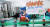 지난 13일 평양의 한 식품공장 근로자가 컨베이어벨트 앞에서 작업하고 있다. 생산을 독려하는 현수막이 눈에 띈다. [AP=연합뉴스]