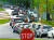 지난 19일 미국 휴스턴의 한 병원 진입로에서 코로나19 드라이브 스루 검사를 받으려는 차량들이 3㎞ 이상 길게 줄을 서있다. [AP=연합뉴스]