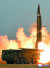 북한 조선중앙통신이 26일 공개한 지난 25일 신형 전술유도탄 시험 발사 장면. [연합뉴스]