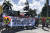 25일 남태평양 섬나라 피지의 수도 수바에서 시위대가 오염수 방류 반대 플래카드를 들고 행진하고 있다. [AFP=연합뉴스]